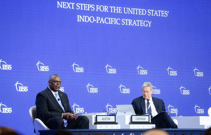 U.S. Secretary of Defense responding to audience questions after giving his address in the First Plenary of the 19th Shangri-La Dialogue in Singapore on June 11, 2022. (Source: IISS via Flickr, with permissions https://www.flickr.com/photos/iiss_org/52137565871/in/album-72177720299702735/)