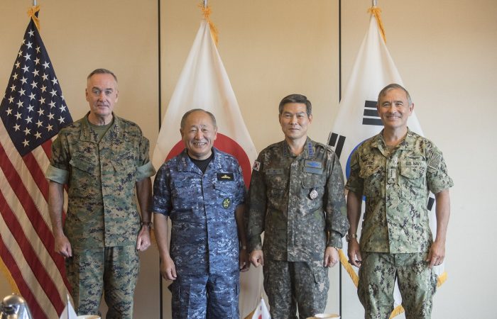 CAMPT SMITH, Hawaii (Oct. 29, 2017)— Left to right, U.S. Chairman of the Joint Chiefs of Staff, Gen. Joseph F. Dunford Jr., Japan Self-Defense Force Chief of Staff, Adm. Katsutoshi Kawano; Republic of Korea (ROK) Chairman of the Joint Chiefs of Staff, Gen. Jeong Kyeong-doo, and Commander, U.S. Pacific Command (USPACOM), Adm. Harry Harris gather for trilateral meeting at USPACOM headquarters. The session was the fifth between the senior most U.S., ROK and Japanese military officers since July, 2014. The leaders discussed multilateral and bilateral initiatives designed to improve interoperability and readiness as well as North Korea’s recent long-range ballistic missile and nuclear tests and agreed to firmly respond to the acts in full coordination with each other. Dunford reaffirmed the ironclad commitment of the U.S. to defend both the ROK and Japan and provide extended deterrence guaranteed by the full spectrum of U.S. military capabilities. (DoD Photo by Navy Petty Officer 1st Class Dominique A. Pineiro, Public Domain)